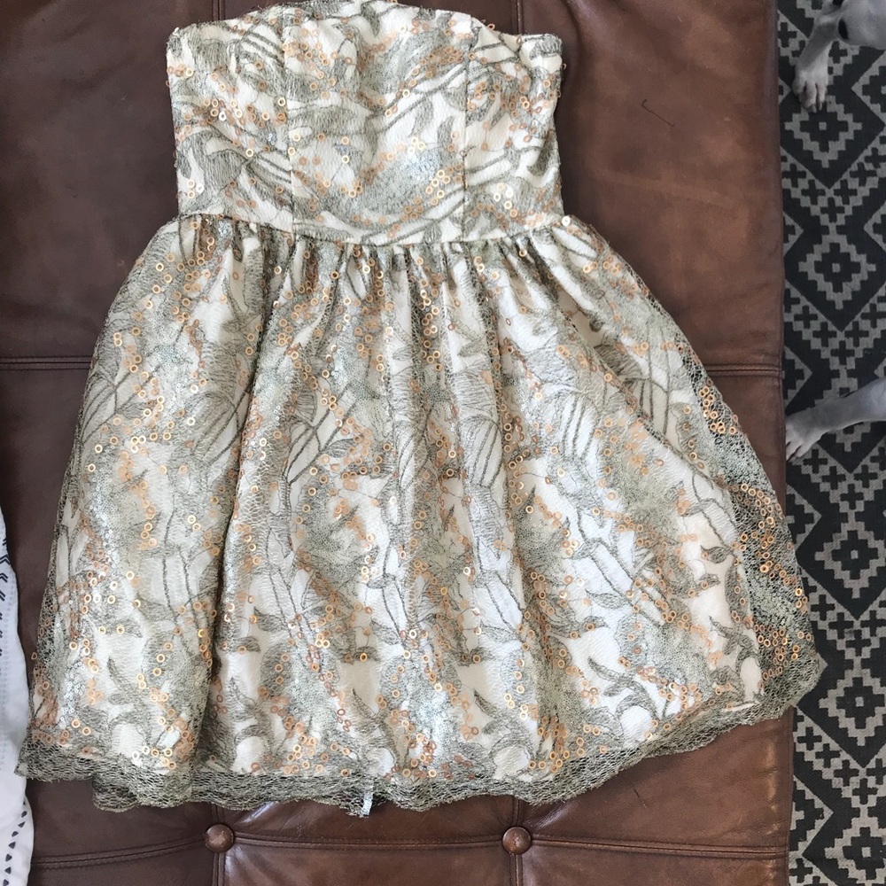 Short gold sequence dress